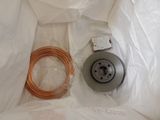 a picture of a sink with a drain and copper wire