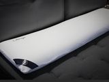 a pillow on the back of a car seat