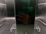 a mirror that is sitting on a counter in a room