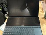 a laptop that is sitting on top of a table