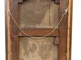 an old wooden easel with a rope on the top of it