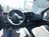 a picture of the interior of a car with a steering wheel