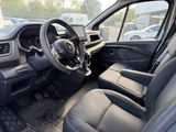 a view of the inside of a vehicle from the driver ' s seat