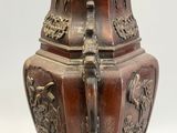 a large vase that is sitting on a table