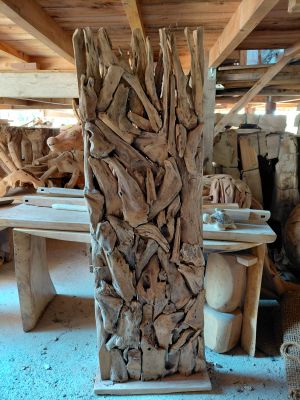 a large piece of drift wood sitting on a table