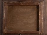 an old picture frame with a brown background and a yellow tag