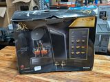 a box that has a coffee machine inside of it