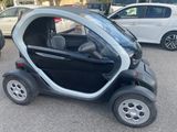 a small car that is parked in the parking lot
