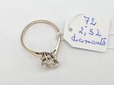 an image of a diamond ring with a price tag attached to it