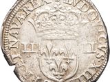 an old silver coin with a crown on top of it
