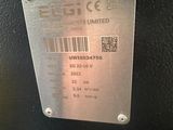 a close up of a metal plate with a barcode on it