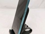 a cell phone that is sitting on a stand