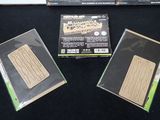 three cardboards that are sitting on a table