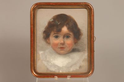 portrait of a young girl in a white dress in a gold frame