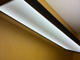 a light that is hanging from the ceiling in a room