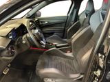 a picture of a car that is inside of a building