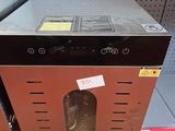 a small oven in the middle of a store shelf
