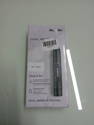 a black pen that is sitting on top of a box