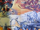 a large poster of a man riding a horse drawn carriage