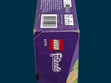 a purple box that has a lego figure inside of it