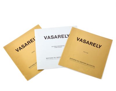 three books of various types of vasarelly on a white surface