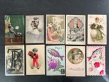 a lot of old postcards that are on the table