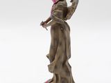 statue of a woman with a top hat holding a bird