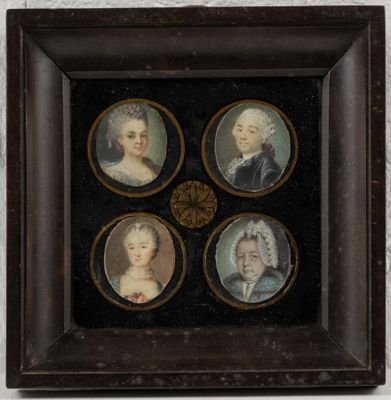 four miniature portraits of people are in a black frame