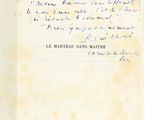 un gros plan sur un livre dont une page est écrite à la main