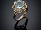 an oval aquamarinee and diamond ring