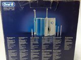 an image of a box of toothbrushes sitting on a white surface