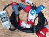 a bunch of electrical cords and plugs on the floor