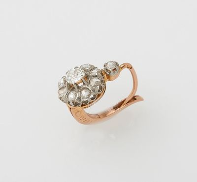 a gold and diamond ring