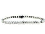 a diamond tennis bracelet on a white background