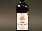 a bottle of wine that is sitting on a table