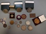 a lot of coins that are sitting on a table