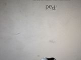 a small hole in the back of an apple ipad