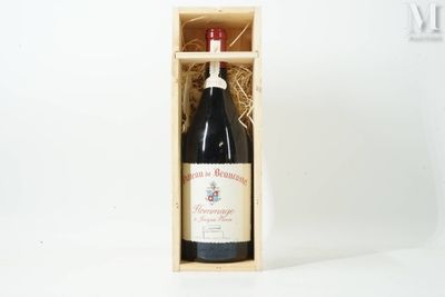 a bottle of wine in a wooden box on a white surface