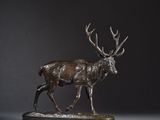 an image of a bronze sculpture of a stag on a base