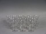 a lot of empty wine glasses on the table