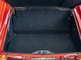 a trunk of a red car with its trunk open