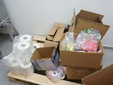 many boxes of toilet paper and toilet paper on a pallet