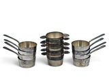 a set of five metal cups with spoons and forks
