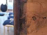 a close up of a piece of wood on a table
