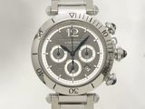 a close up of a watch on a white background