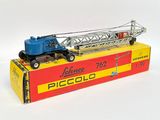 a toy truck with a crane on top of it