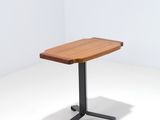 an image of a wooden table with a black metal base