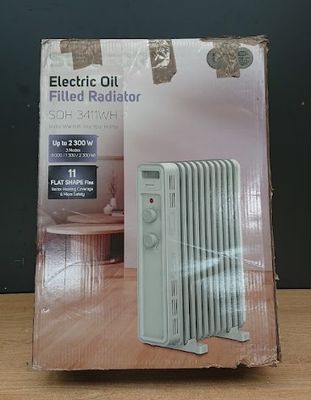 un radiateur électrique à huile posé sur une table