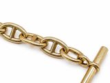 an image of a close up of a chain with a cross on it