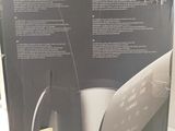 the box of the wii controller is open on the table